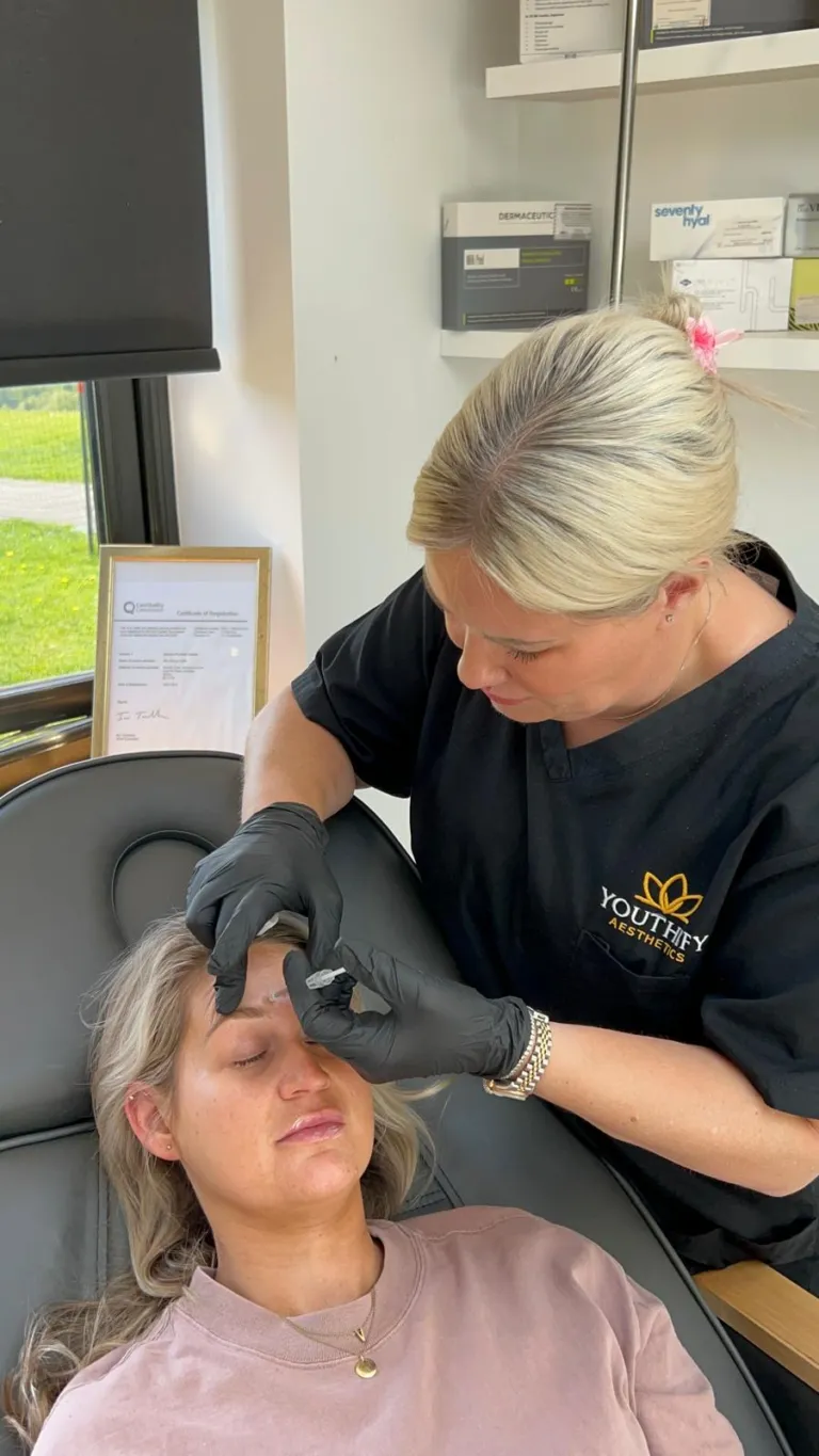 Registered Nurse Stacey performing aesthetic injection